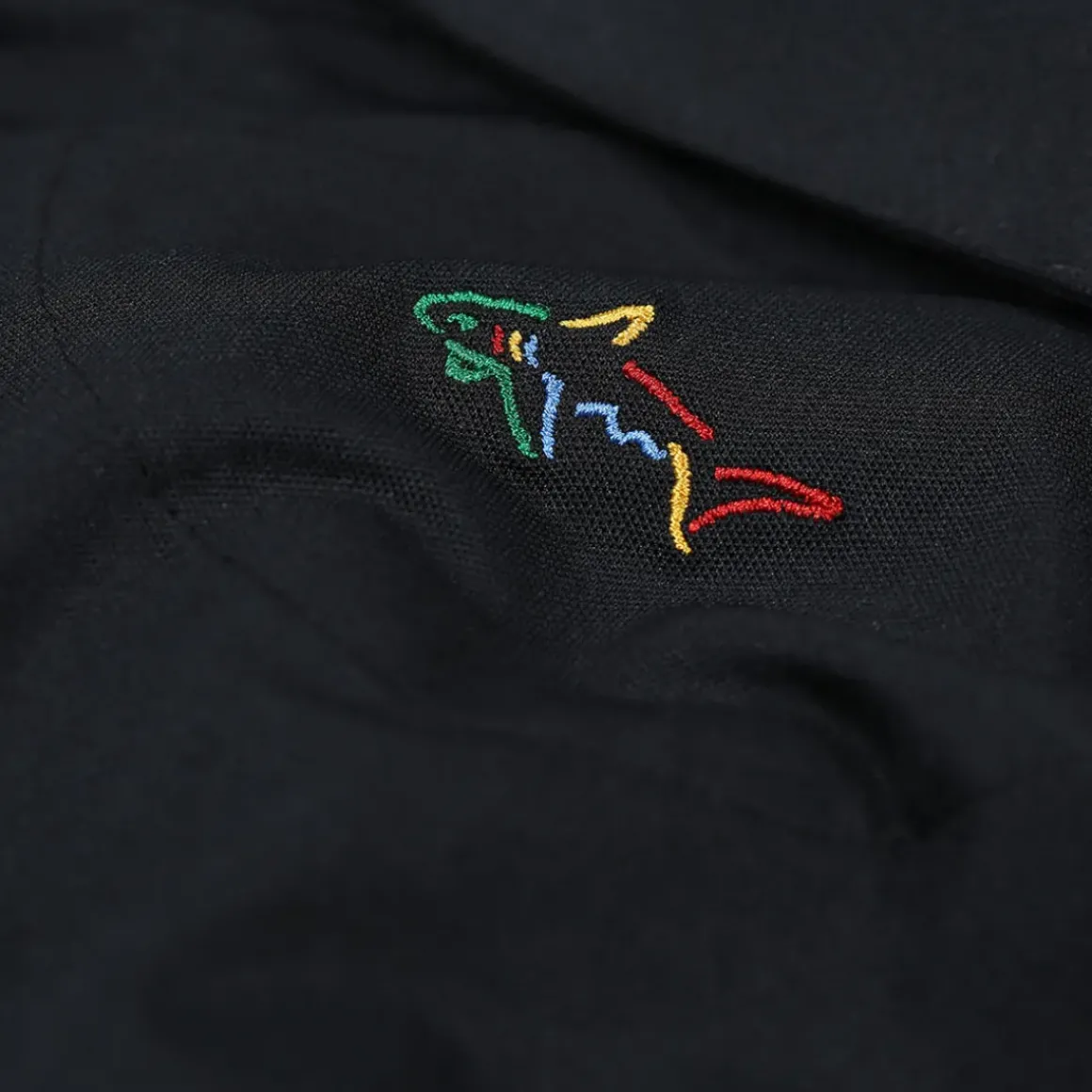 Greg Norman Men's Neck Logo Stretch Golf Polo Shirt