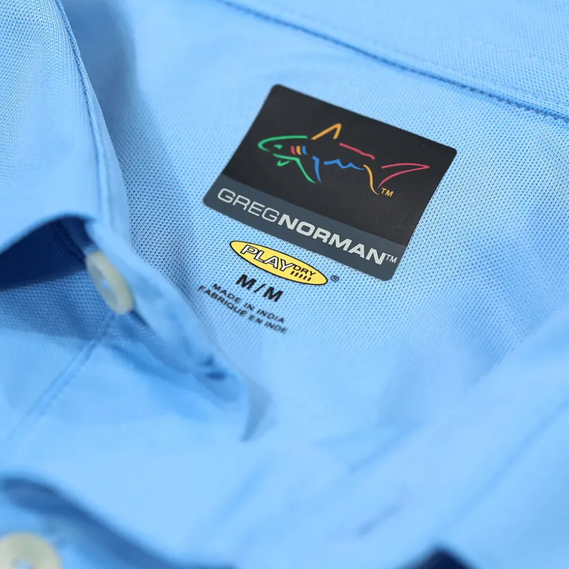 Greg Norman Men's Neck Logo Stretch Golf Polo Shirt